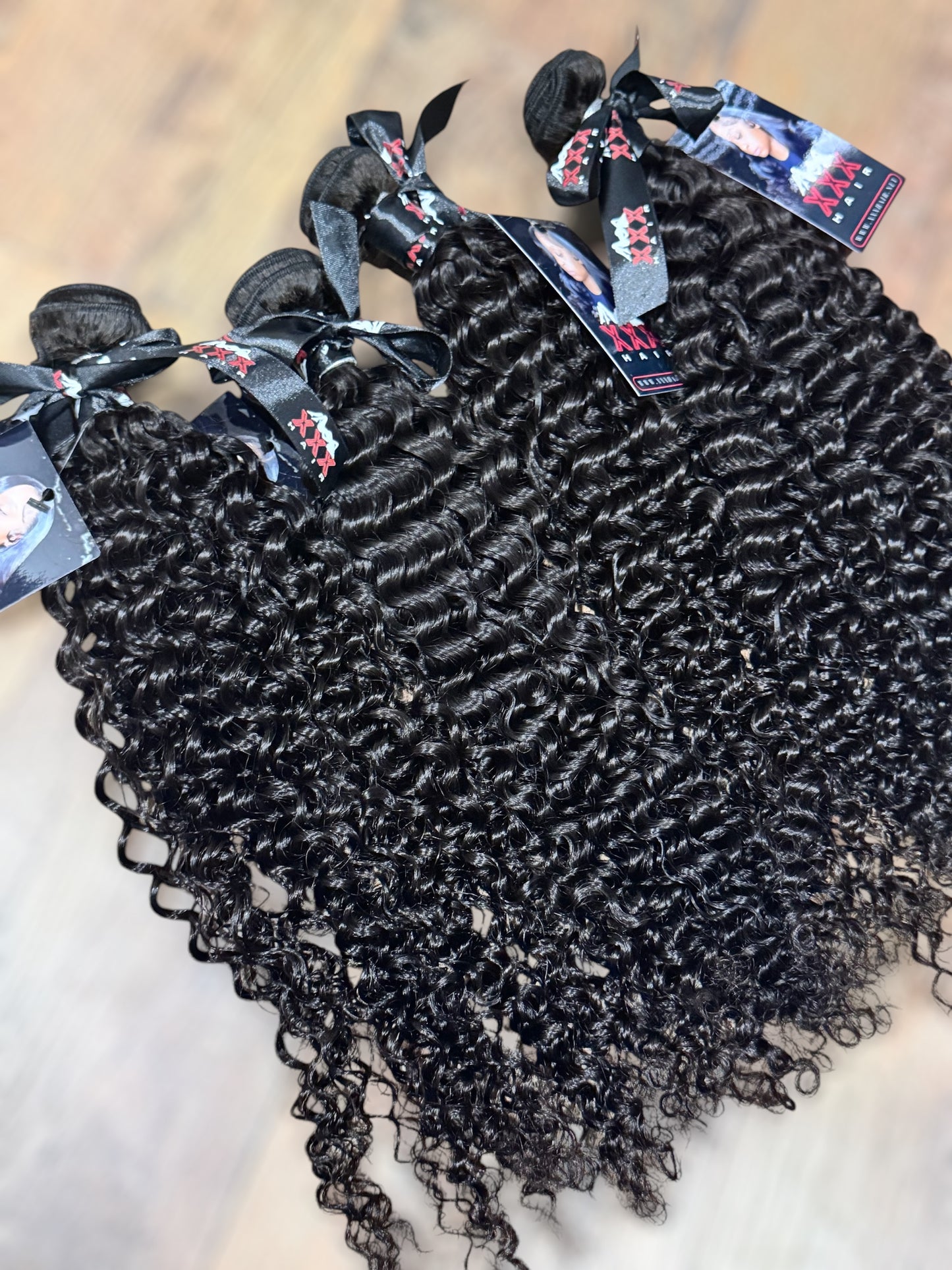 4 Bundles of Deep Curly Virgin Hair Bundles 22”,22”,24”,24”