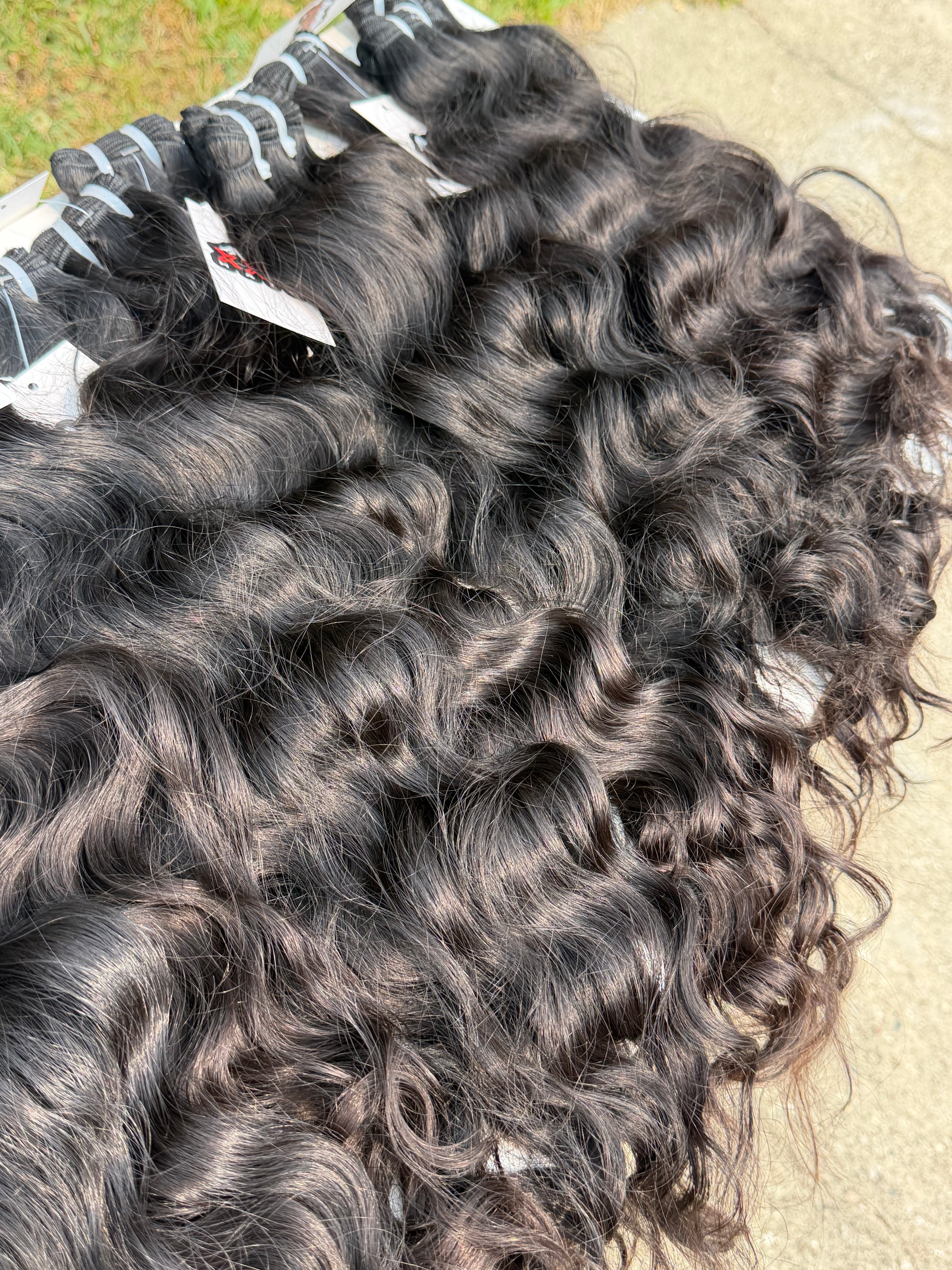 3 Bundles Of Raw Indian Wavy Human Hair Deal 18”20”22”
