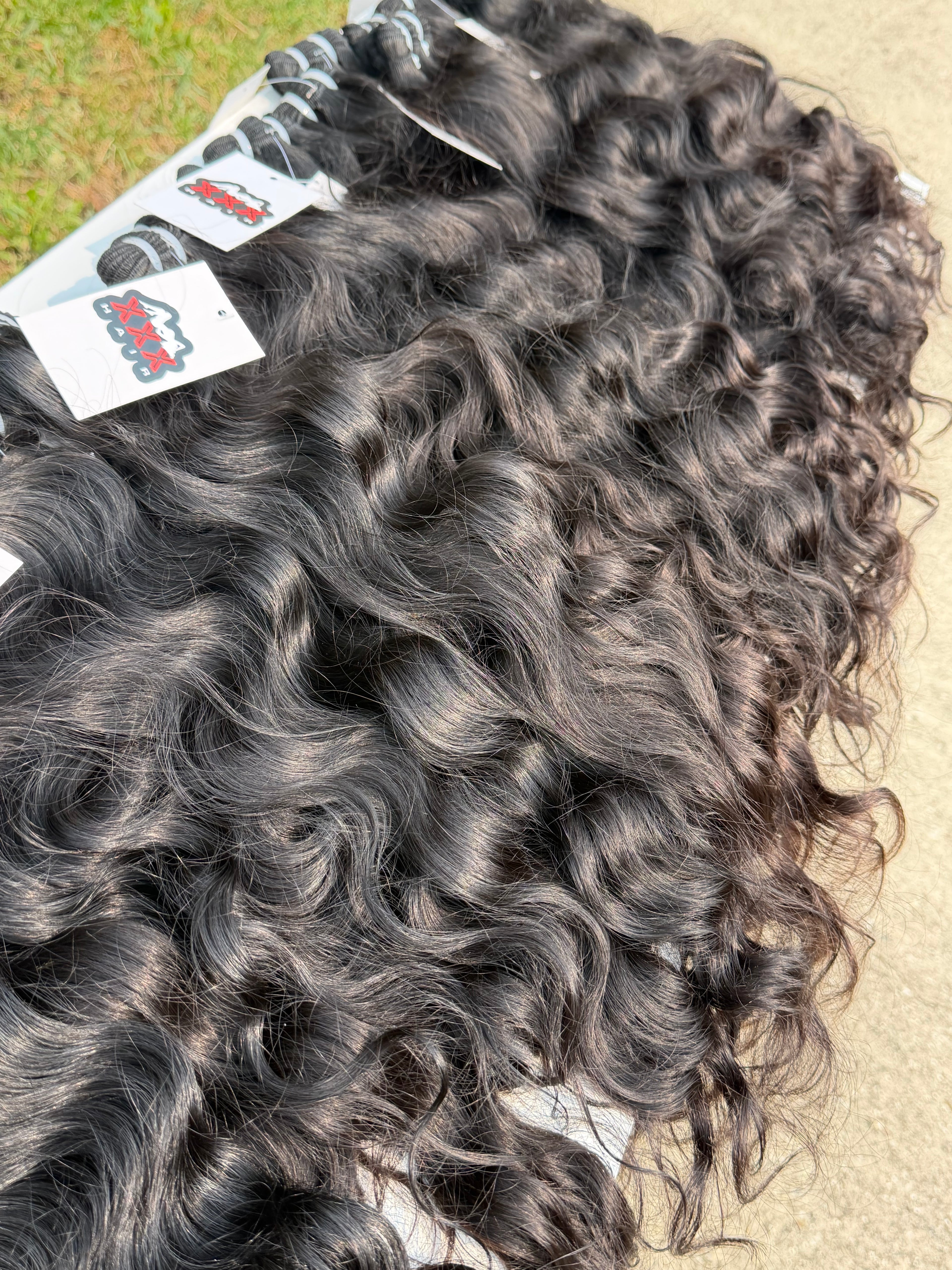 3 Bundles Of Raw Indian Wavy Human Hair Deal 18”20”22”