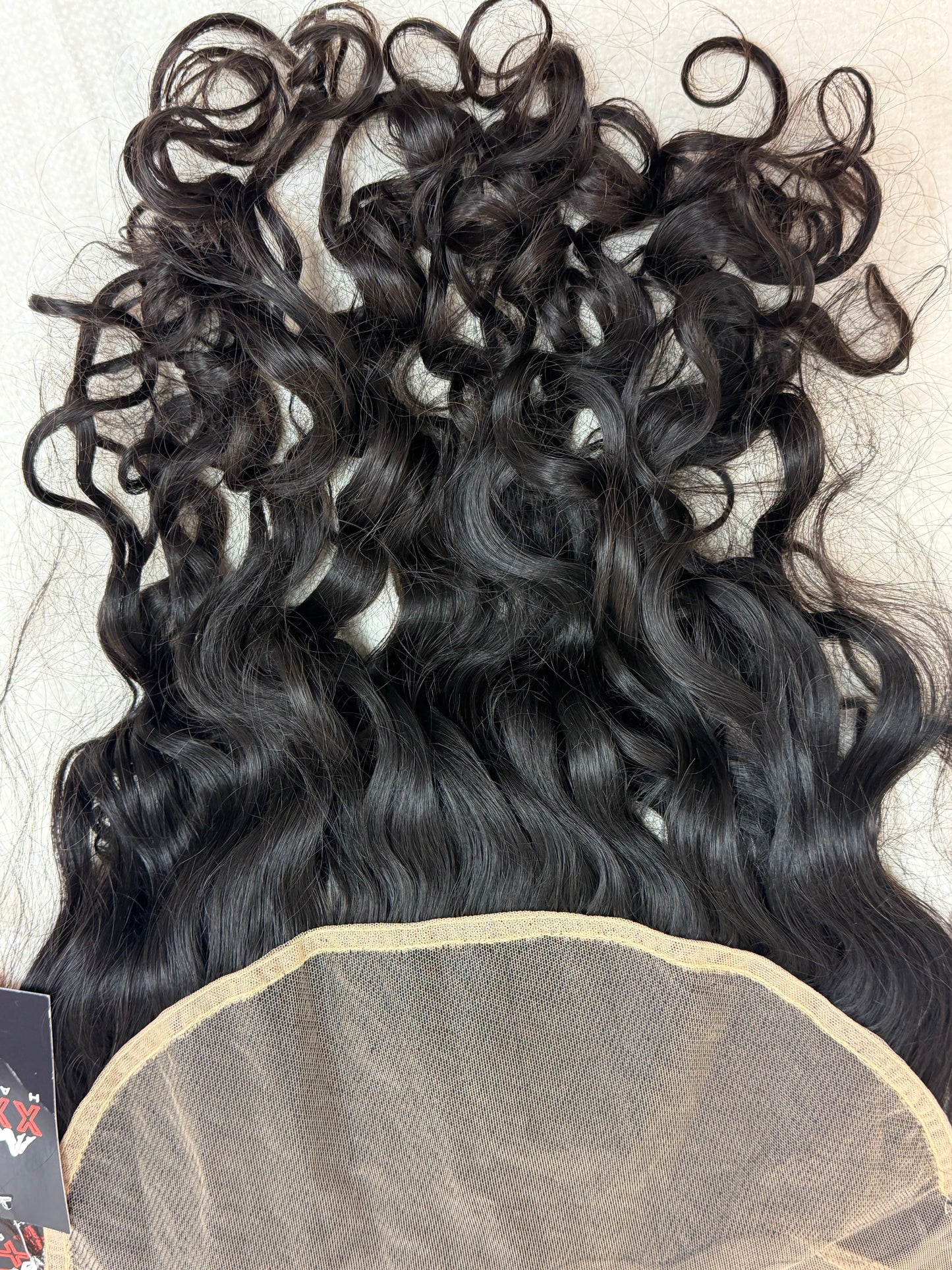 20” Raw Indian Curly 13*6 Transparent Lace Frontal