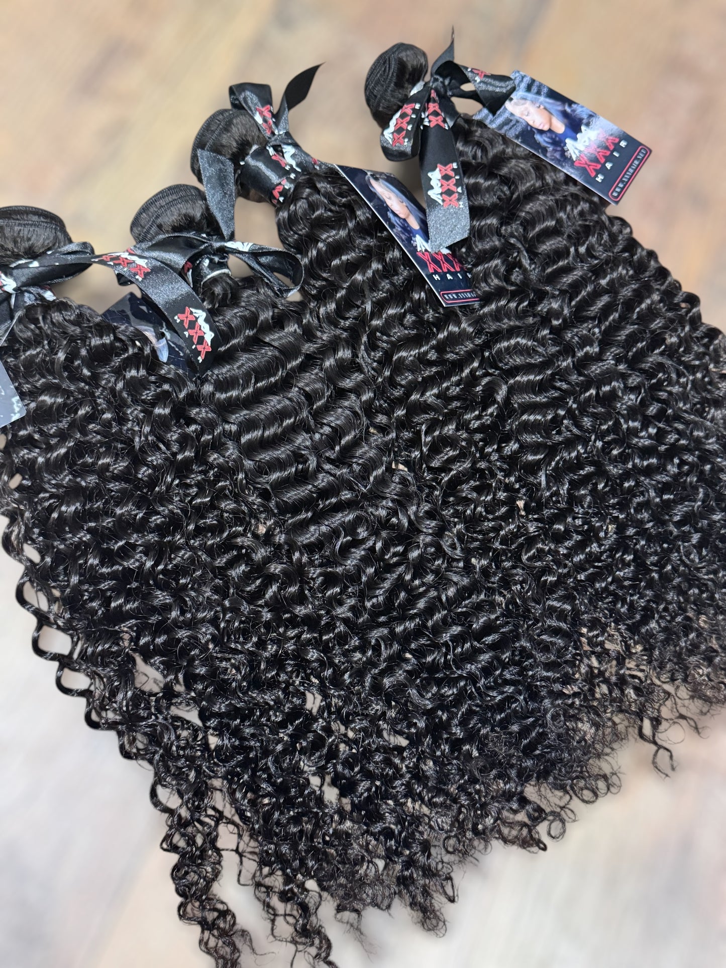 4 Bundles of Deep Curly Virgin Hair Bundles 22”,22”,24”,24”